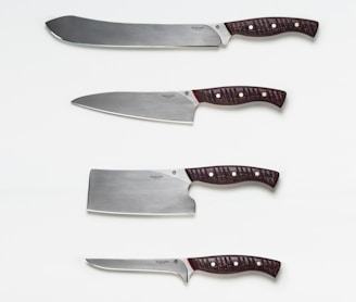 red and silver kitchen knife